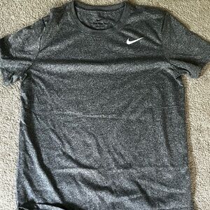 The Nike Tee women’s size small DRI-FIT material